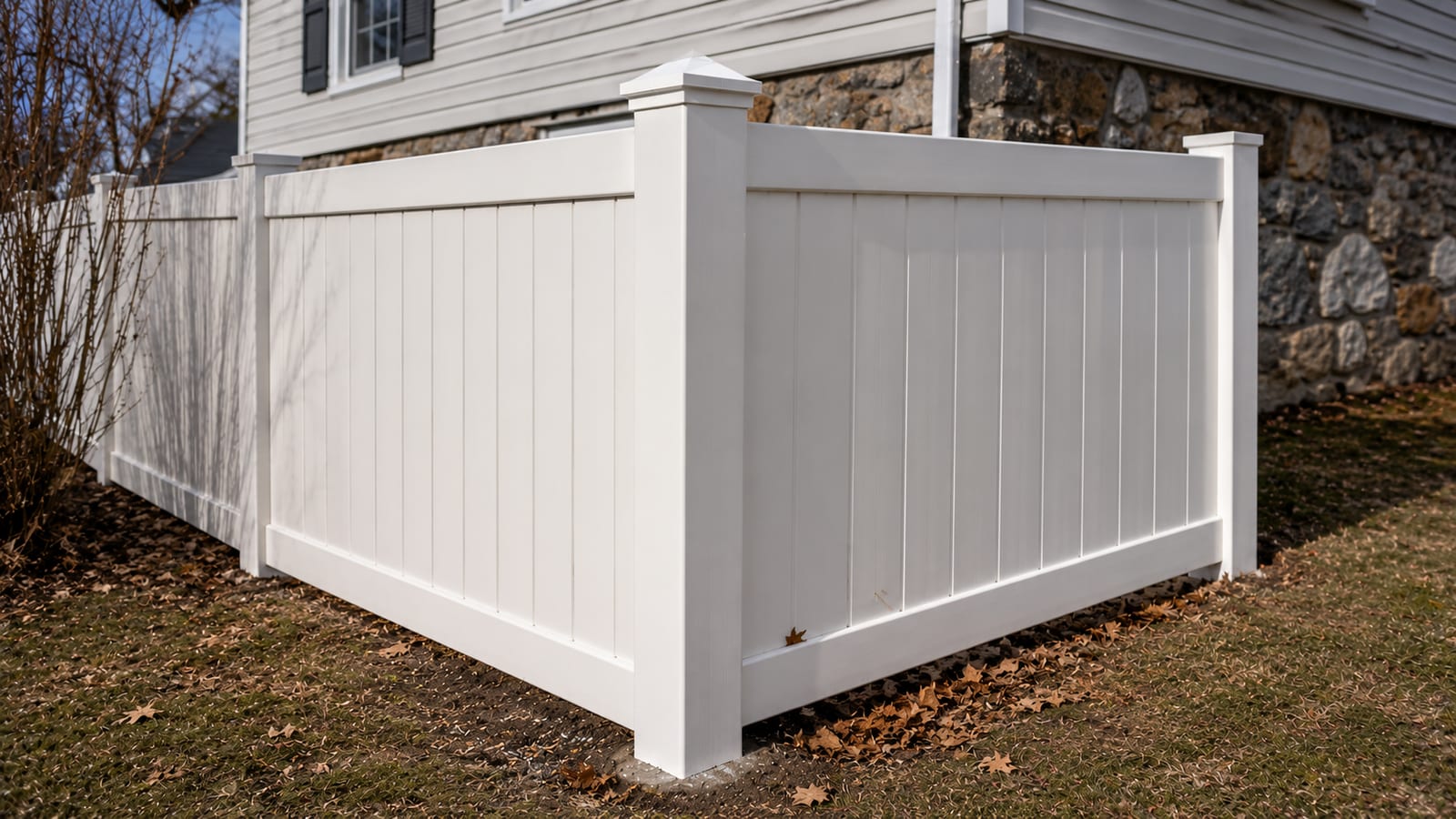 A reinforced vinyl privacy fence gate at a residential side yard